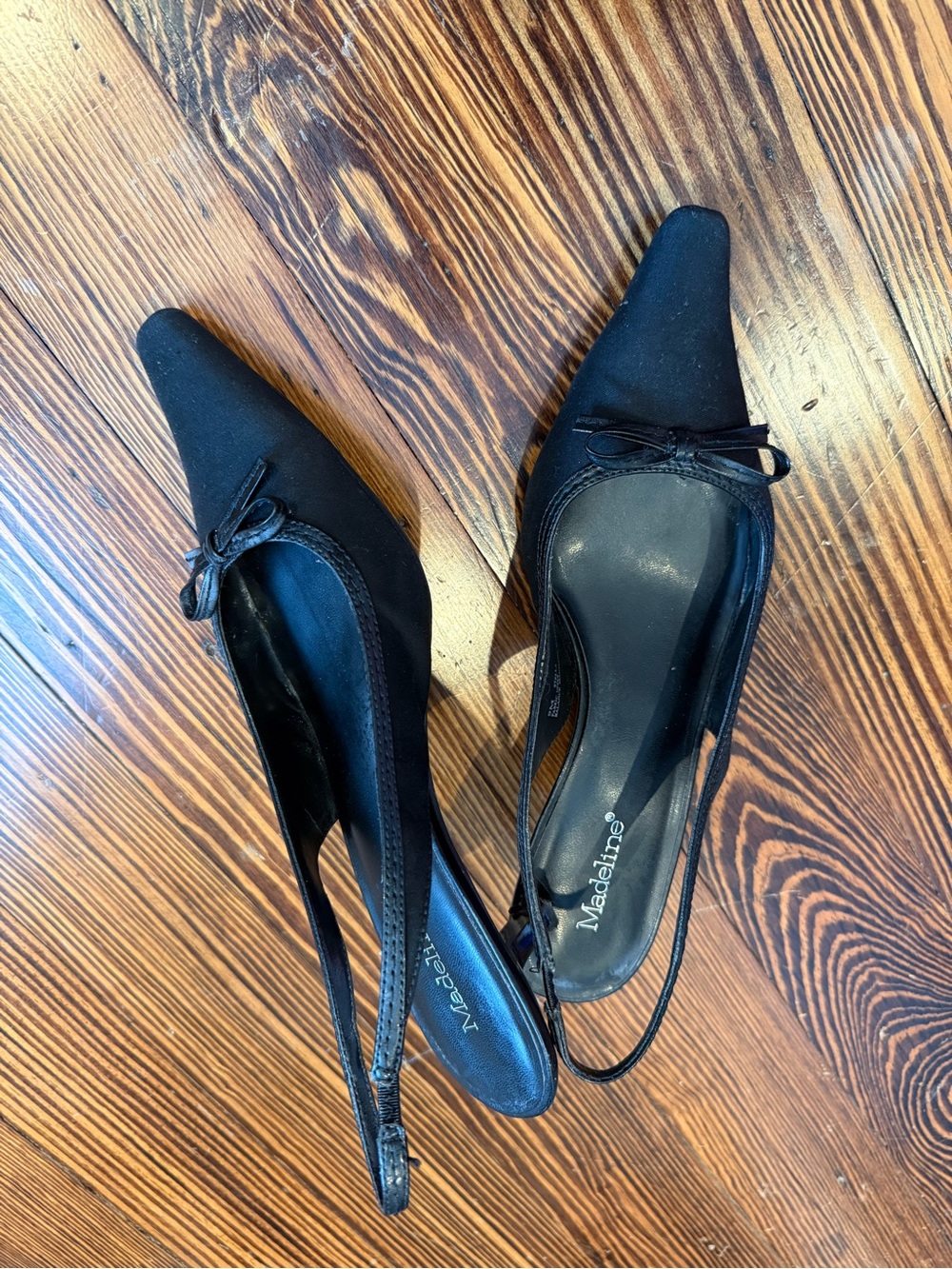Madeline Black Pointed-Toe Slingback Pumps with Bow Accent